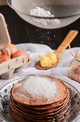 Chocolate Pancake with powdered sugar