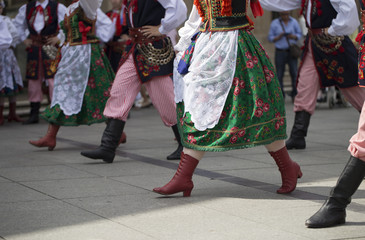 Polish folk dance group with traditional costume - 189508966