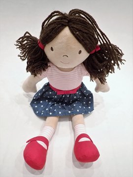 Child's toy rag doll with pigtails