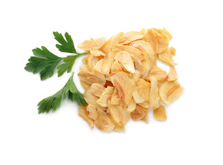 Dried garlic flakes on white background