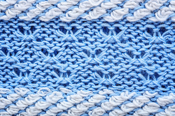 Blue knitted fabric texture as background, closeup