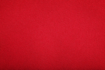 Fototapeta premium Red cotton fabric texture as background, closeup