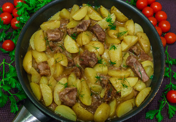 Fresh veal, stewed with potatoes at home.