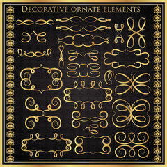 Set of golden decorative elements on a black background