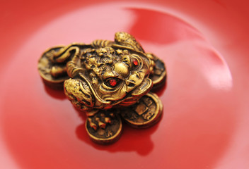 Golden Buddha on a black background 
