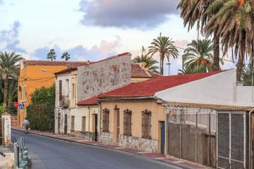 Fototapeta premium Street view, colored houses and palm trees in Murcia,Spain.