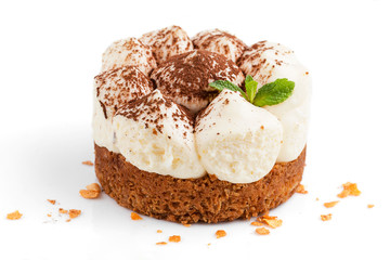air cake tiramisu sprinkled with chocolate on a white background