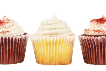 Close up on three delicious birthday cupcakes, isolated on white background.