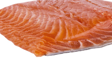 Delicious portion of fresh salmon fillet isolated on white background.