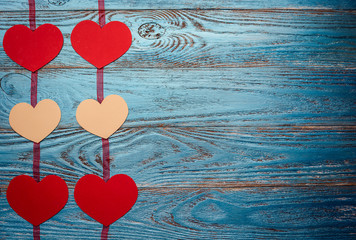 Valentines day background decorated with red hearts/copy space