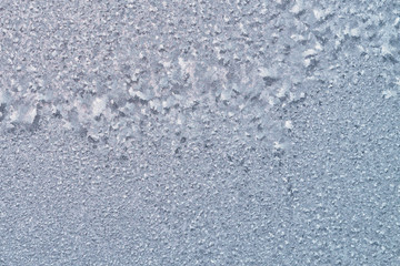 Ice on glass texture background. Cold climate of frost.
