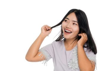 Portrait of a beautiful asian woman smiling. Isolated on white background