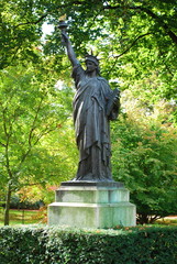 A minature version of the Statue of Liberty in the gardens of the Palace du Luxembourg in Paris, France