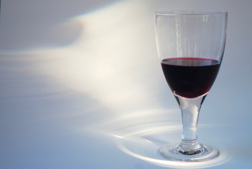 Red drink in a transparent glass