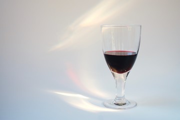 Red drink in a transparent glass 1