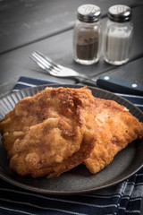 Two fried cod fillet pieces.