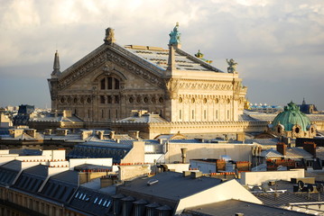 The roof of the Palais Garnier Opera House in Paris at sunset