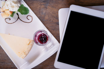 Notebook and tablet with food