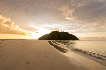 golden sunset at Kelambu Beach, Sabah Malaysia.