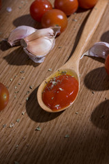 homemade tomato sauce on rustic table