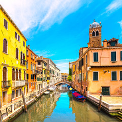 Venice cityscape, water canal, campanile church and traditional buildings. Italy