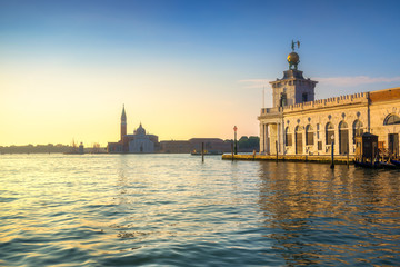 Fototapeta na wymiar Venice lagoon, San Giorgio church and Punta della Dogana at sunrise. Italy