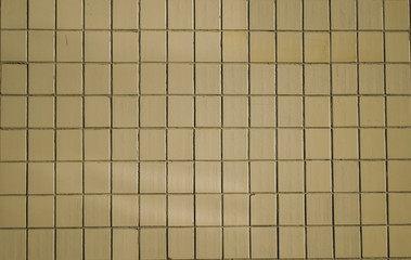 White soviet tiles on the wall outdoors