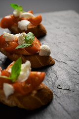 bruschetta with mozzarella and tomatoes