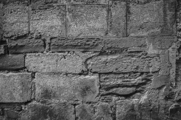 Monochrome of old stone wall texture background