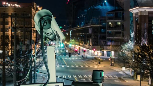 City Surveillance Camera Rotating Intersection Night Time-Lapse