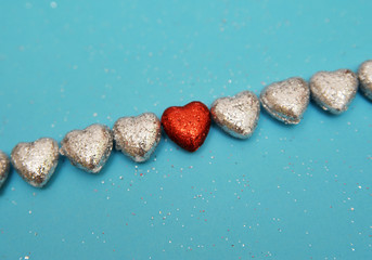 Red hearts on a black background 