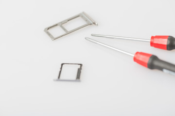 Small screwdriver with sim slot