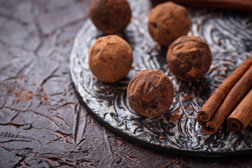 Fototapeta na wymiar Candy truffles with cocoa powder