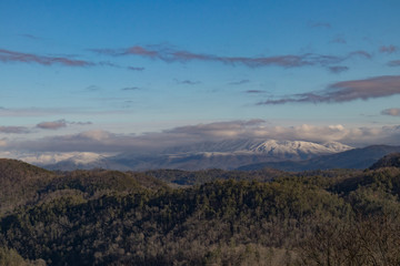 Clouds over the snow covered mountain range and peaks in Great Smoky Mountains National Park