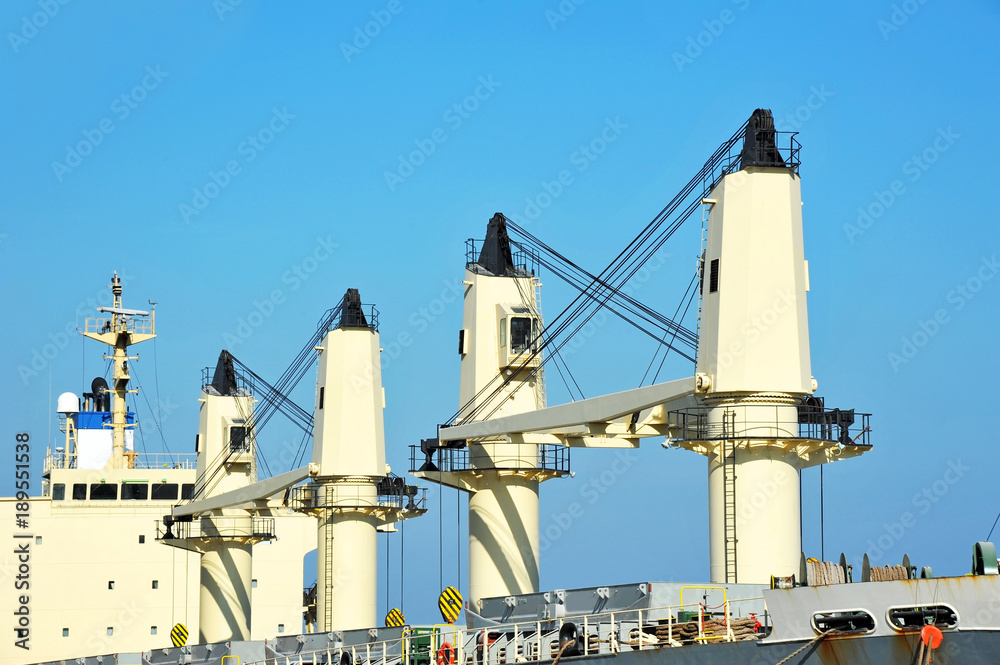 Wall mural cargo cranes on bulker