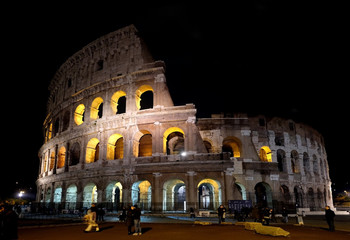 Ancient amphitheater Colosseum in the night