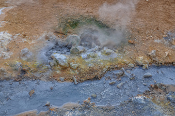 Fototapeta na wymiar Geothermal Activity Near a Steam in Iceland