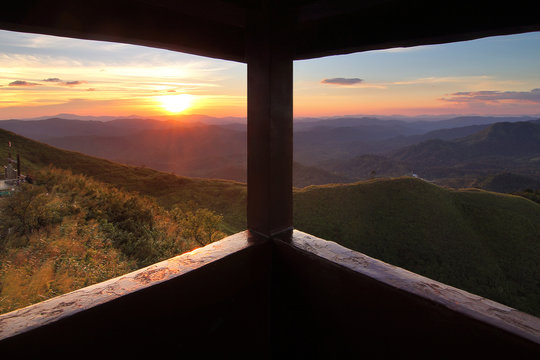 Fototapeta View from the window. Beautiful scenery during sunset at Nern Chang Suek Mountain, Kanchanaburi province in Thailand. Freedom and natural Concept