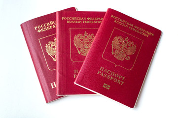 Three passport of the citizen of the Russian Federation on a white background