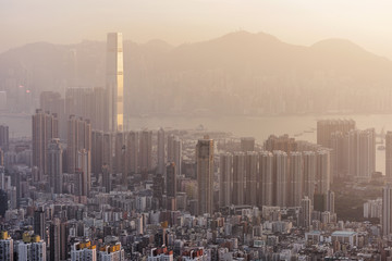 Fototapeta premium Dense high rise apartments in Kowloon peninsula view from Beacon Hill in the evening, Hong Kong