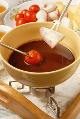 Delicious chocolate fondue with fruit.  