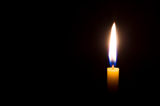 Several designs of candle light on dark background