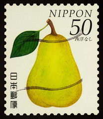 Yellow pear on postage stamp © Vic