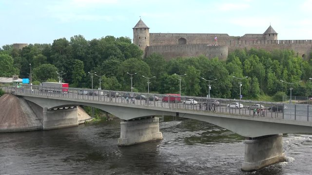 The bridge of Friendship, cloud  day in august. The border of Russia and Estonia