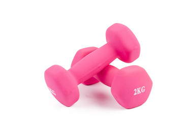 Close-Up Of Pink Dumbbells On White Background