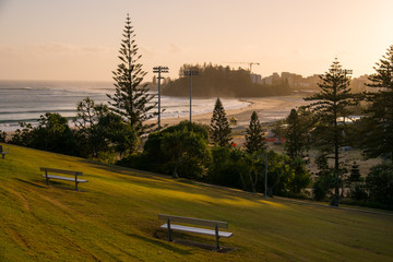 Gold Coast, Queensland/Australia - 18 January 2018: Park benches with sunrise views from Kirra Hill...