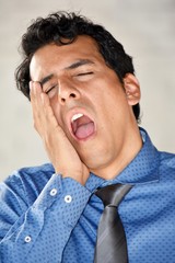 Tired Hispanic Person Wearing Tie