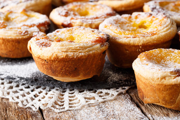 Portuguese delicious pastel de nata closeup on a table. horizontal