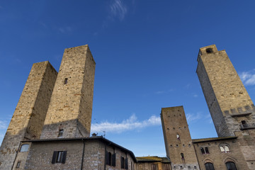 The towers of San Gimignano against the blue sky, Siena, Tuscany, Italy