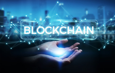 Businesswoman using blockchain cryptocurrency interface 3D rendering